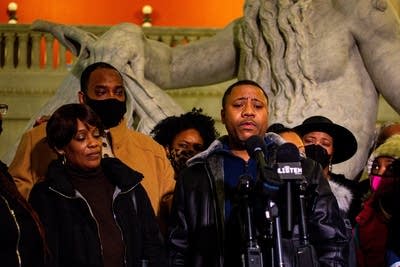 Amir Locke's father, Andre Locke, speaks during a press conference