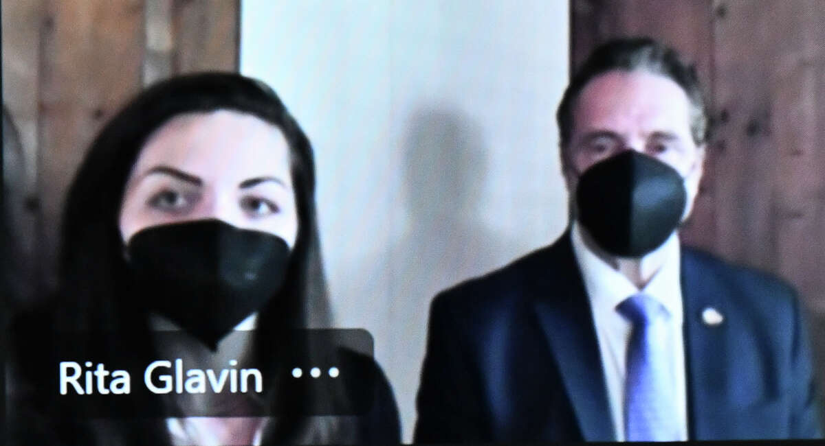 Former New York Gov. Andrew Cuomo, right, with his attorney Rita Glavin, left, is shown virtually for an arraignment in Albany City Court before Judge Holly Trexler, who consider a prosecutor’s request to dismiss a fondling case against him on Friday, Jan. 7, 2022, in Albany, N.Y. The case was dismissed. (Hans Pennink,Pool)