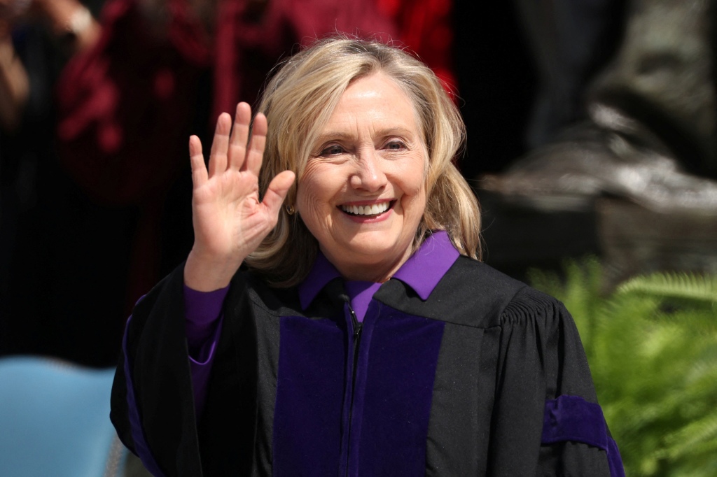 Former U.S. Secretary of State Hillary Rodham Clinton waves before receiving an Honorary Doctor of Laws Degree during the Columbia University commencement ceremony in Manhattan, New York City, U.S., May 18, 2022. 